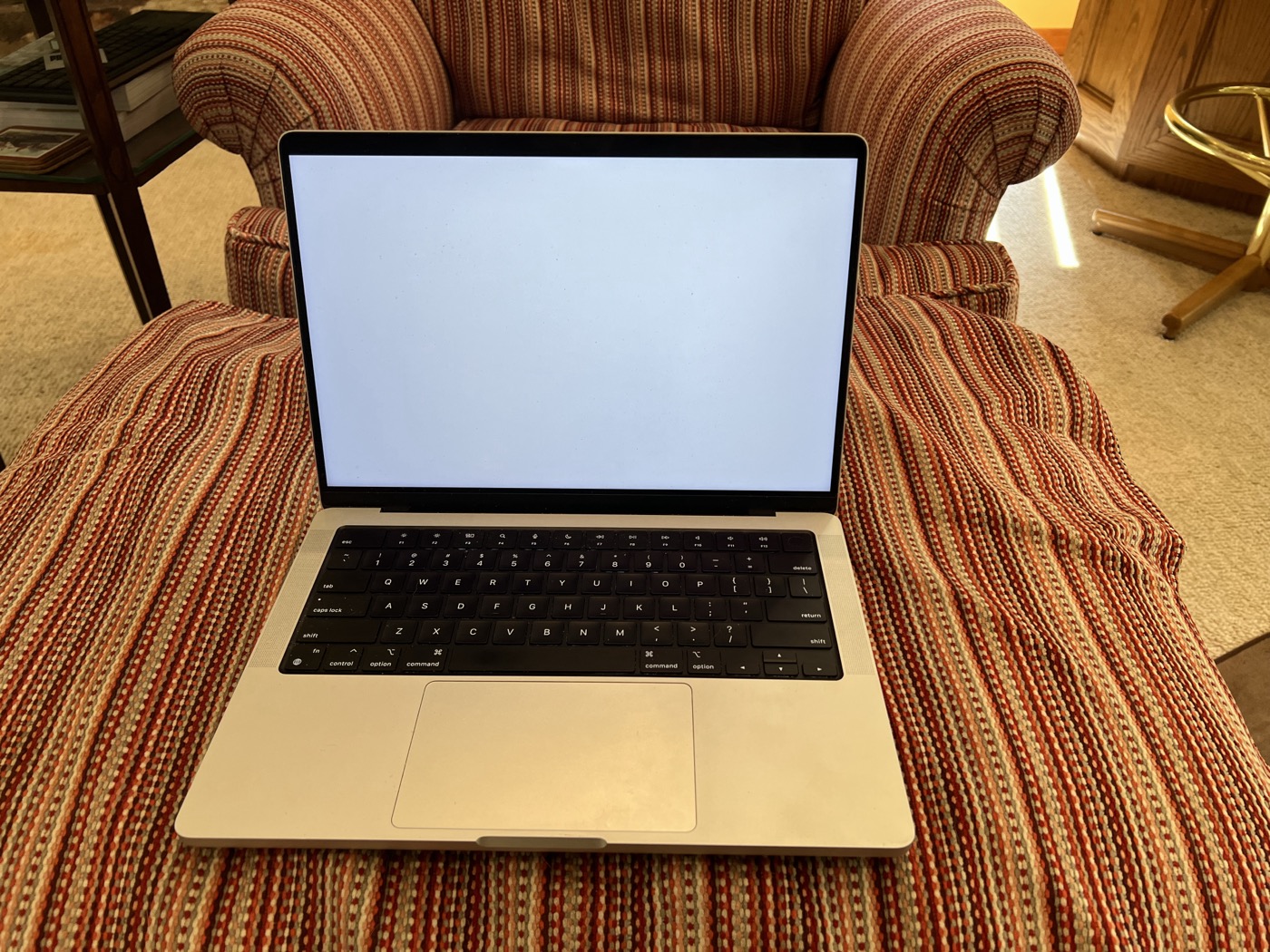 Silver MacBook Pro laptop on a white background